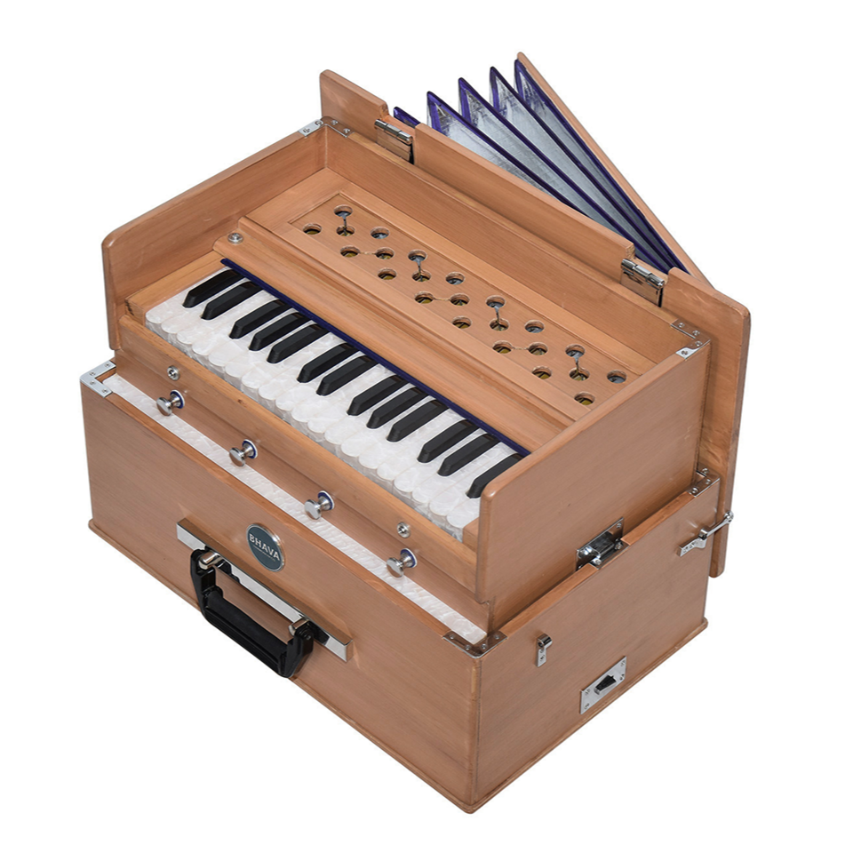 A Bhava Mini 'Kirtan' Harmonium in natural wood color with chrome hardware, shown with its keys and bellows open.