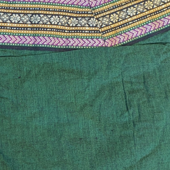 Close-up of material of Green mridanga cover